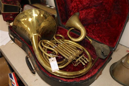 A cased horn, a French horn, a banjo etc (4)